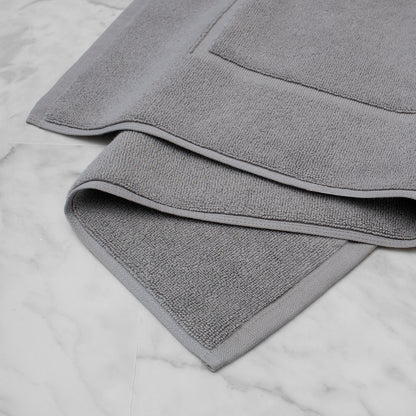 The Grey Bath Mat
