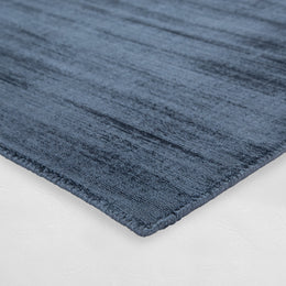 The Solid Mirage Hand-Loomed Rug